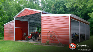 Ridgeline barn with customized end wall enclosures and tractor parked inside.